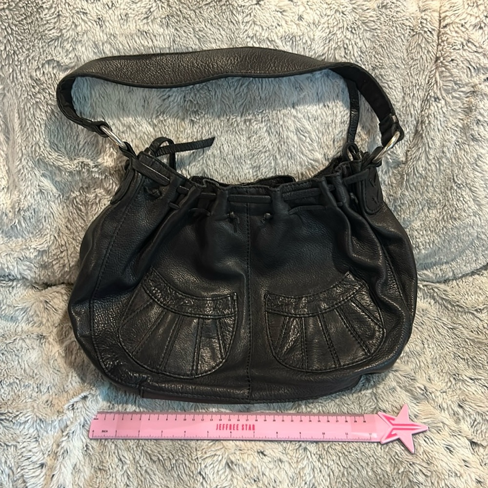 Lucky Brand 100% genuine black pebble leather really soft.